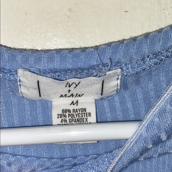 light blue t shirt with crinkles on the sleeve - Picture 3 of 3